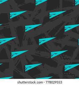 Abstract seamless triangles pattern in blue colors on grunge grey shabby background. Dark wallpaper. Geometric shape set repeated backdrop for boy,textile, sport clothes, wrapping paper