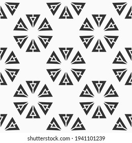 Abstract seamless triangles pattern. Repeating geometric shapes. Texture for wallpaper, packaging, invitations, business cards, fabric print. Vector monochrome background.