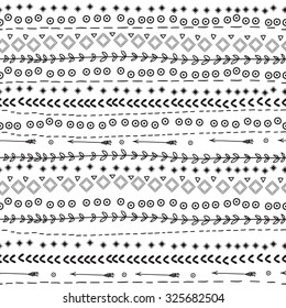 Abstract seamless tribal vector background . Monochrome black and white hand-drown  illustration .