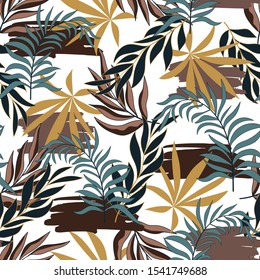 Abstract seamless tropical pattern with bright yellow and brown plants and leaves on delicate background. Summer colorful hawaiian seamless pattern with tropical plants. Tropic leaves in bright colors