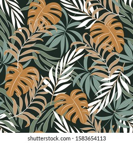 Abstract seamless tropical pattern with bright yellow plants and leaves on a green background. Modern abstract design for fabric, paper, interior decor. Tropical botanical.