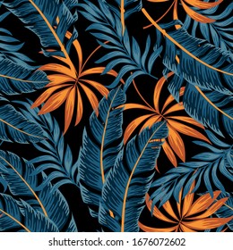 Abstract seamless tropical pattern with bright plants and leaves on a black background. Jungle leaf seamless vector floral pattern background. Beautiful seamless vector floral pattern.