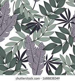 Abstract seamless tropical pattern with bright leaves and plants on a white background. Jungle leaf seamless vector floral pattern background. 
Beautiful exotic plants. 