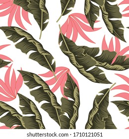 Abstract seamless tropical pattern with bright plants and leaves on a light background. 
Jungle leaf seamless vector floral pattern background. Beautiful exotic plants. 