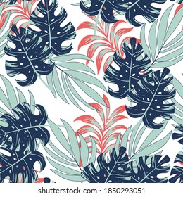 Abstract seamless tropical pattern with bright plants and leaves on a white background. Tropical botanical. Seamless pattern with colorful leaves and plants.