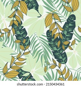 Abstract seamless tropical pattern with bright plants and leaves on a gray background. Seamless exotic pattern with tropical plants. Tropic leaves in bright colors. Exotic jungle wallpaper.