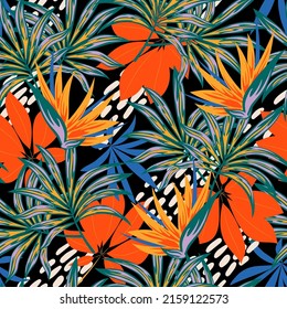 Abstract seamless tropical pattern with bright plants and leaves on a black background. Vector design. Jungle print. Floral background.  Summer colorful hawaiian. Trendy summer Hawaii print.