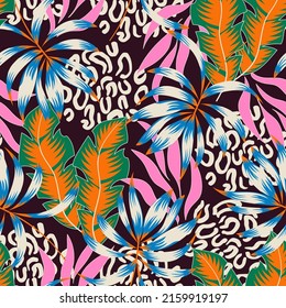 Abstract Seamless Tropical Pattern With Bright Plants And Leaves On A Dark Background. Vector Design. Jungle Print. Floral Background.  Beautiful Seamless Vector Floral Pattern. Exotic Wallpaper.