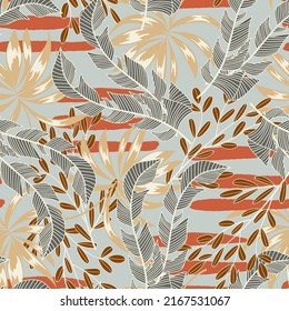 Abstract seamless tropical pattern with bright plants and leaves on a gray background. Beautiful seamless vector floral pattern. Trendy summer Hawaii print.