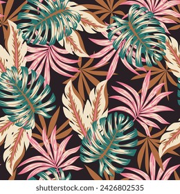 Abstract seamless tropical pattern with bright plants and leaves on a dark background. Vector design. Jungle print. Floral background.  Colorful stylish floral.