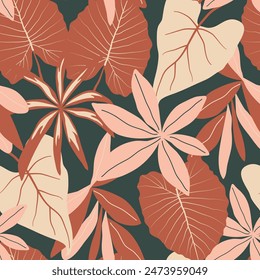 Abstract seamless tropical pattern with bright plants and leaves on a dark green background. Seamless pattern with colorful leaves and plants. Summer colorful hawaiian.