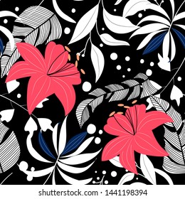 Abstract seamless tropical pattern with colorful leaves, plants and flowers on a dark background. Vector design. Jungle print. Floral background. Printing and textiles. Exotic tropics. Summer.