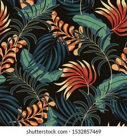 Abstract seamless tropical pattern with colorful yellow and green plants and leaves on dark background. Seamless exotic pattern with tropical plants. Beautiful seamless vector floral pattern.