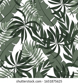 Abstract seamless tropical pattern with colorful plants and leaves on a light background. Beautiful seamless vector floral pattern. Summer colorful hawaiian seamless pattern with tropical plants.