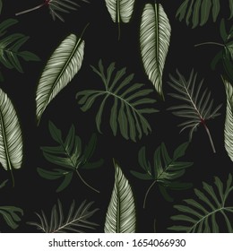 Abstract seamless tropical pattern with colorful leaves on black background. Seamless exotic pattern with tropical plants. Exotic wallpaper. Trendy summer Hawaii print.