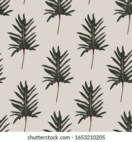 Abstract seamless tropical pattern with dark green colorful leaves on vintage background. Seamless exotic pattern with tropical plants. Exotic wallpaper. Trendy summer Hawaii print.