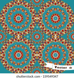 Abstract seamless vector background. Multicolored round figures. 