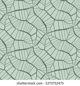Abstract seamless vector pattern background. Cracks, leaves, veins. Light pastel green color. on black background
