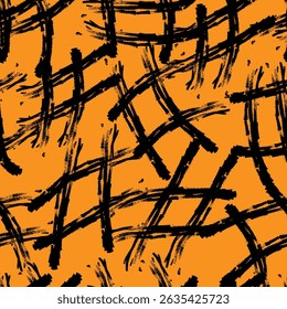 Abstract, seamless vector pattern consisting of a chaotic ornament of black brush strokes on an orange background, for decorating your designs in an abstract style
