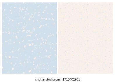 Abstract Seamless Vector Patterns with Freehand Brush Stains. White Splashes on a Pastel Blue and Light Cream Background. Irregular Grunge Stone Backdrop. Splash Print Ideal for Textile, Decoration.