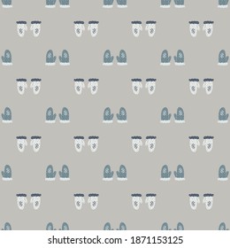 Abstract seamless winter pattern with warm mittens elements. Grey and blue colored artwork. Stock illustration. Vector design for textile, fabric, giftwrap, wallpapers.