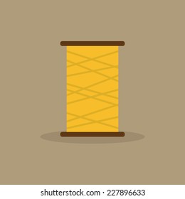 abstract sewing object on a light brown background