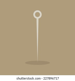 abstract sewing object on a light brown background