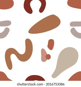 Abstract shapes in orange, yellow, beige and brown in flat modern style. Seamless pattern. Vector illustration.