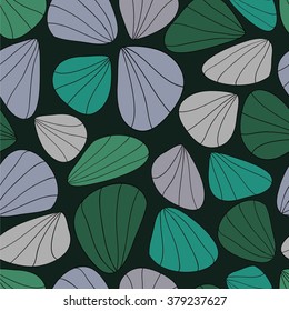 Abstract shells colored in shades of green seamless pattern 