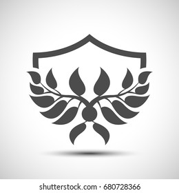 Abstract shield with leaves. Security sign. Unique template of the security company. Wings leaves.