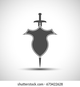 Abstract shield and sword emblem with shadow.