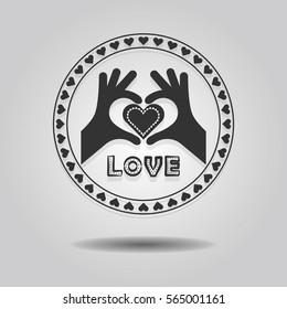 Abstract showing heart symbol hands and word love in circle emblem on gray gradient background
