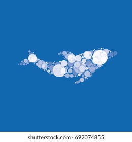 abstract silhouette of dolphin filled with circles of different sizes and shades of color