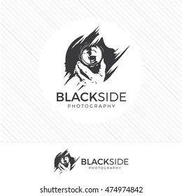 abstract silhouette photography logo. Vintage style camera icon vector with photographer holding a lens.