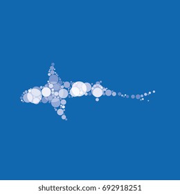 abstract silhouette of shark filled with circles of different sizes and shades of color