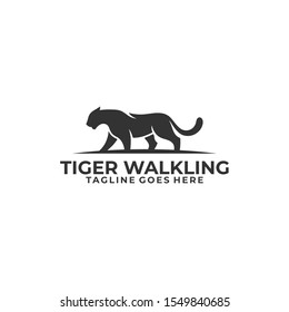 Abstract Silhouette Tiger Walking Concept illustration vector template. Suitable for Creative Industry, Multimedia, entertainment, Educations, Shop, and any related business