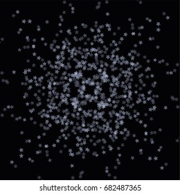 Abstract silver confetti isolated on a black background.