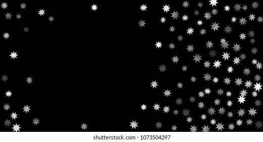 Abstract silver star of confetti. Falling starry background. Random stars shine on a black background. The dark sky with shining stars.  Suitable for your design, cards, invitations, gifts. 