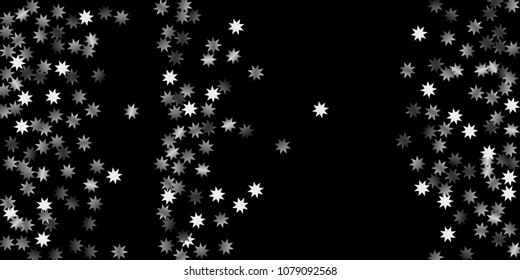 Abstract silver star of confetti. Falling starry background. Random stars shine on a black background. The dark sky with shining stars.  Suitable for your design, cards, invitations, gifts. 