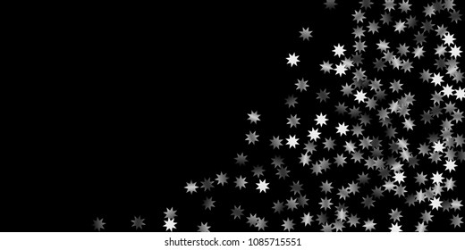 Abstract silver star of confetti. Falling starry background. Random stars shine on a black background. The dark sky with shining stars.  Suitable for your design, cards, invitations, gifts. 