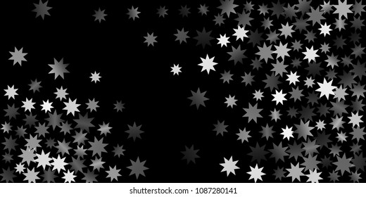 Abstract silver star of confetti. Falling starry background. Random stars shine on a black background. The dark sky with shining stars.  Suitable for your design, cards, invitations, gifts. 