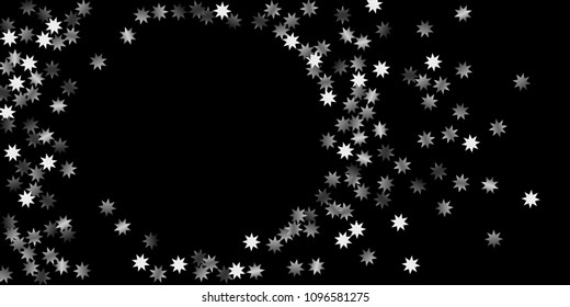 Abstract silver star of confetti. Falling starry background. Random stars shine on a black background. The dark sky with shining stars.  Suitable for your design, cards, invitations, gifts. 