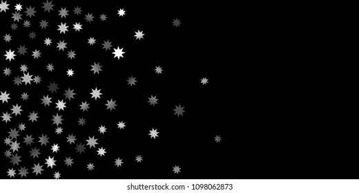 Abstract silver star of confetti. Falling starry background. Random stars shine on a black background. The dark sky with shining stars.  Suitable for your design, cards, invitations, gifts. 