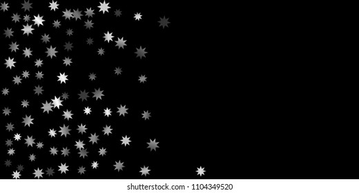Abstract silver star of confetti. Falling starry background. Random stars shine on a black background. The dark sky with shining stars.  Suitable for your design, cards, invitations, gifts. 