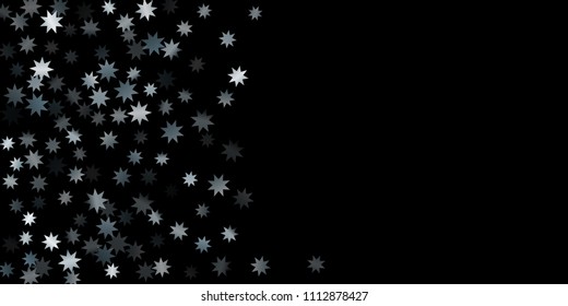 Abstract silver star of confetti. Falling starry background. Random stars shine on a black background. The dark sky with shining stars.  Suitable for your design, cards, invitations, gifts. 