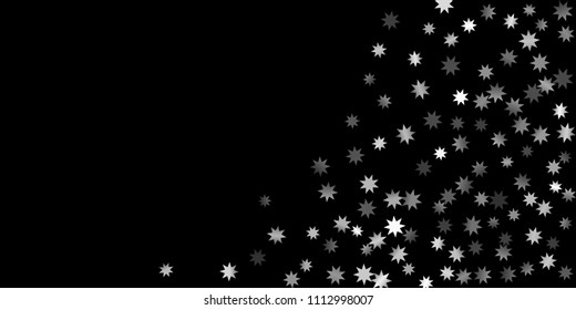 Abstract silver star of confetti. Falling starry background. Random stars shine on a black background. The dark sky with shining stars.  Suitable for your design, cards, invitations, gifts. 