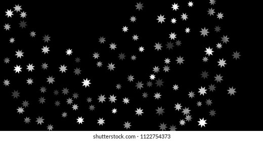 Abstract silver star of confetti. Falling starry background. Random stars shine on a black background. The dark sky with shining stars.  Suitable for your design, cards, invitations, gifts. 