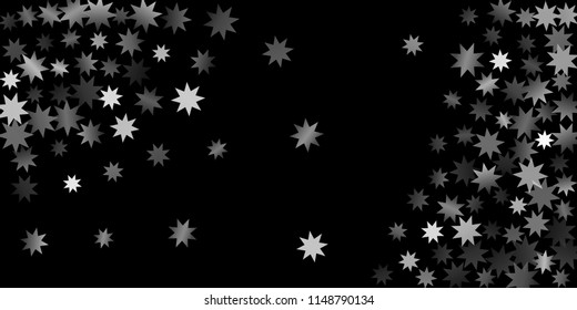 Abstract silver star of confetti. Falling starry background. Random stars shine on a black background. The dark sky with shining stars.  Suitable for your design, cards, invitations, gifts. 