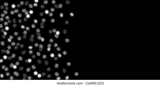 Abstract silver star of confetti. Falling starry background. Random stars shine on a black background. The dark sky with shining stars.  Suitable for your design, cards, invitations, gifts. 