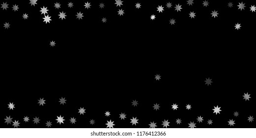Abstract silver star of confetti. Falling starry background. Random stars shine on a black background. The dark sky with shining stars.  Suitable for your design, cards, invitations, gifts. 